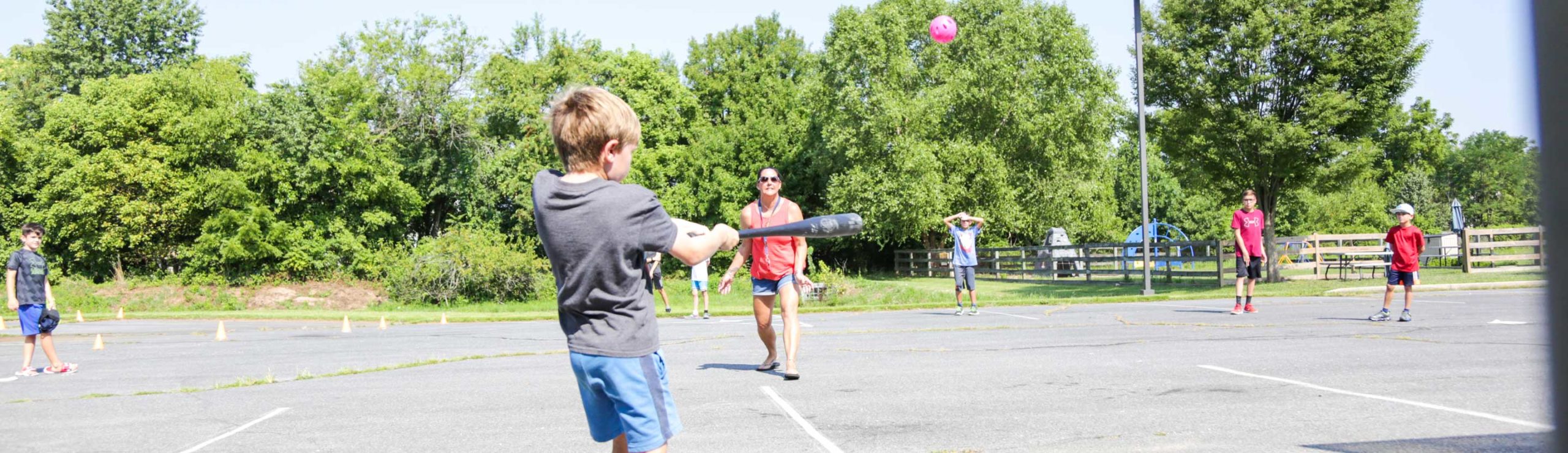 Campers playing baseball