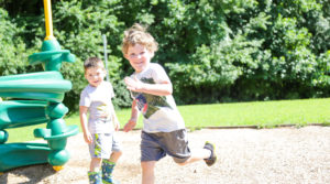 Camper running on the playground