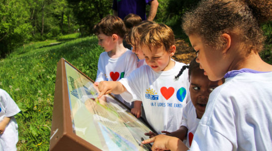 Campers looking at a map