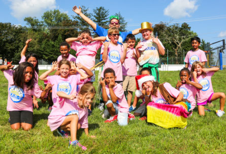 Group of campers in pink making silly faces